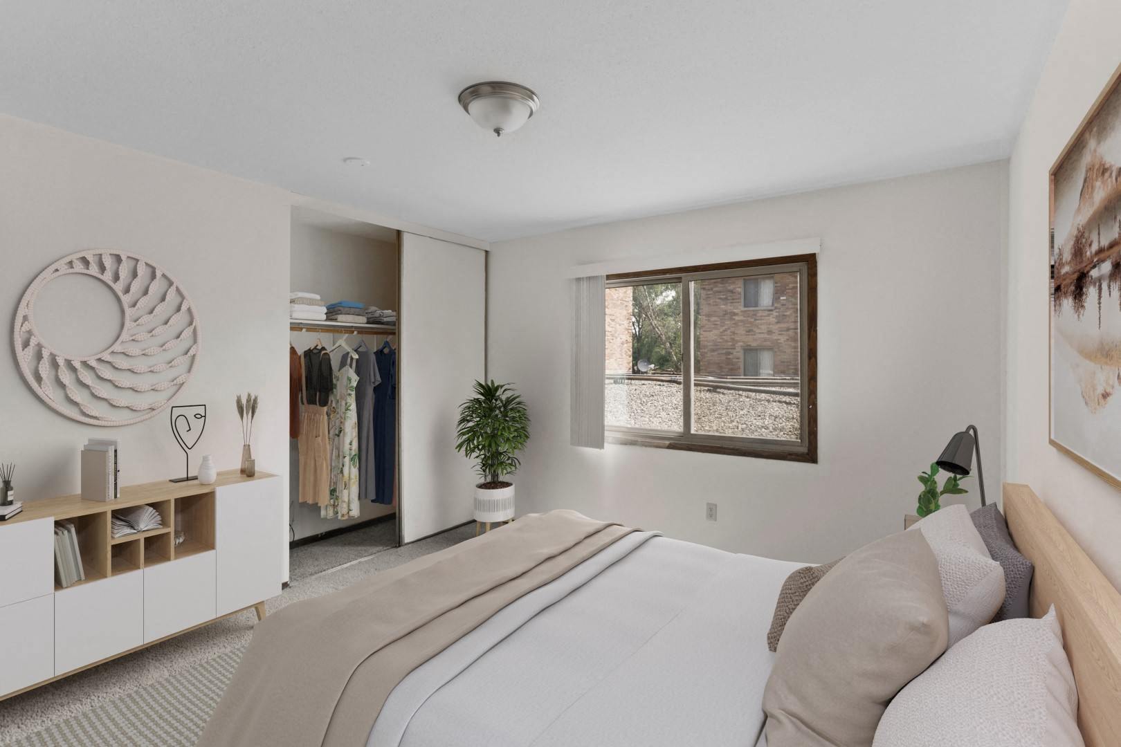 a bedroom with a large bed and a window